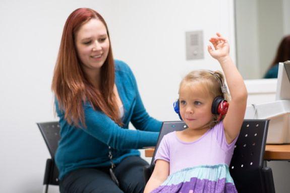 a student working with a patient