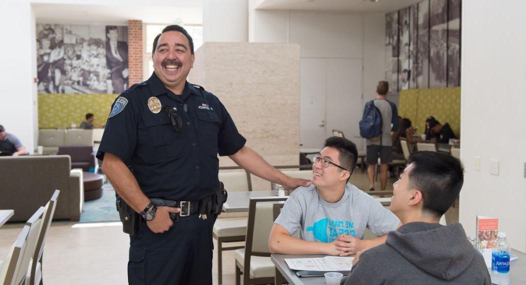 a public safety office talks to students