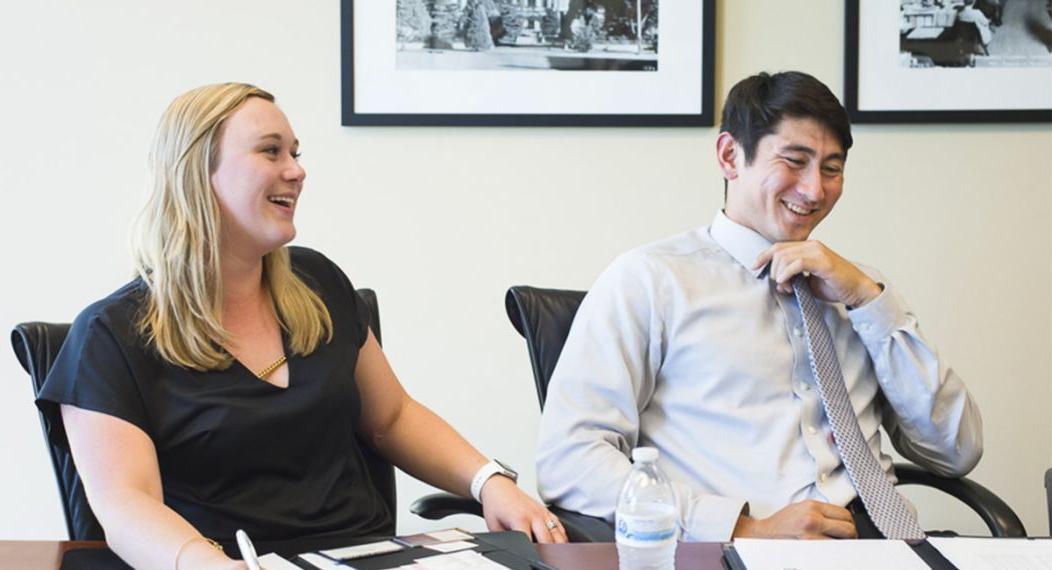 Sarah Gamble and Alex Giannini, students participating in SacSum, meet with Chris Micheli of Aprea & Micheli, a government relations firm in Sacramento, June 23, 2016.